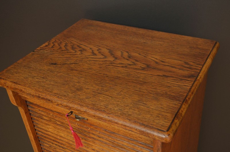 An Oak Tambour Filing Cabinet-nimbus-antiques-3-4-main-638197781448843872.jpeg