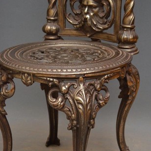 Pair Of Decorative Cast Iron Chairs