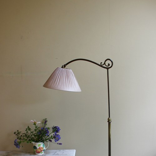 Sleek Understated Brass Adjustable Floor Lamp