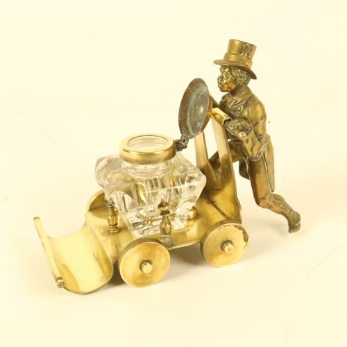Victorian Brass Ink Stand Of A Gentleman With A Cart