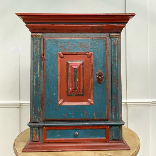 A Northern European Painted Cupboard 