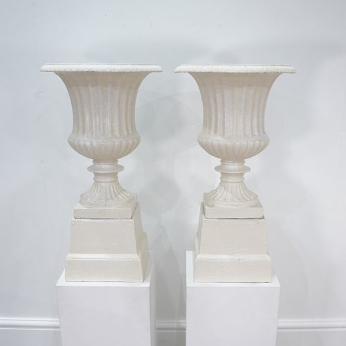 Urns On Plinths