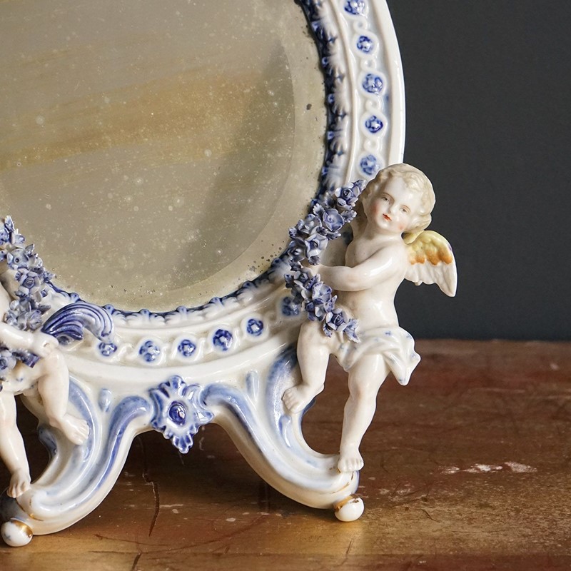 Antique German Porcelain Table Mirror With Cherubs, 19Th Century-rag-and-bone-1-dsc05929-main-638041382249101312.jpeg