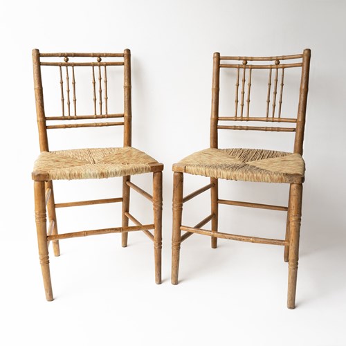 Pair Of Antique Regency Faux Bamboo Rush Seat Chairs