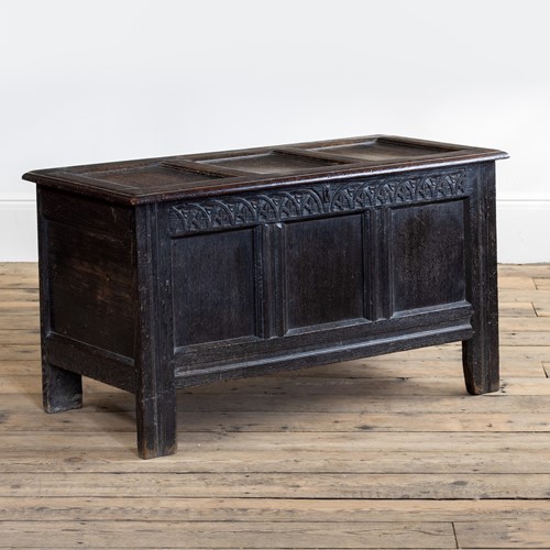 A late 17th century panelled oak coffer