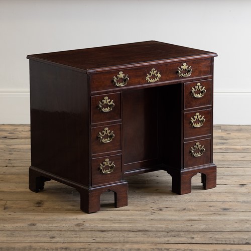 A George III mahogany kneehole desk