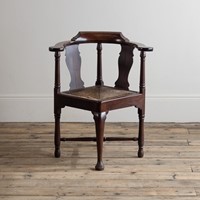 A George II mahogany corner chair