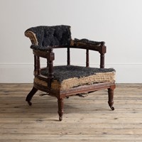 A late 19th century mahogany arm chair