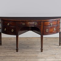 A large George III mahogany demi-lune sideboard