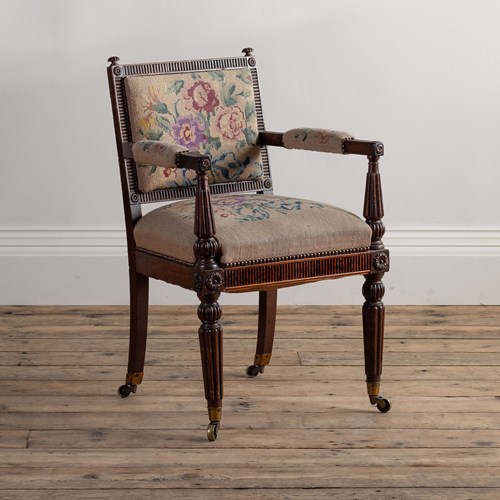 A 19Th Century Upholstered Arm Chair