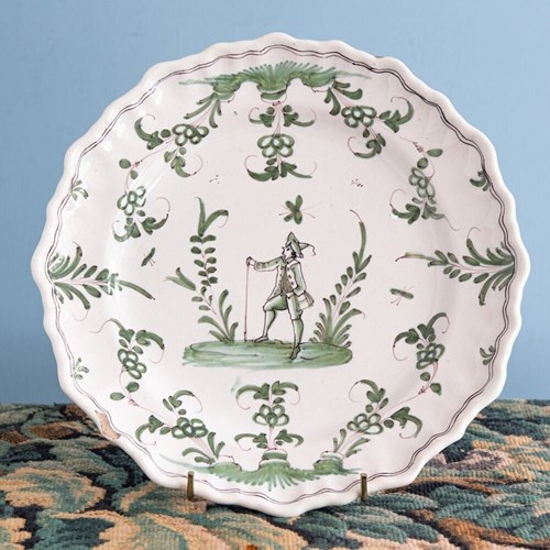 French Faience, Shaped Green Plate With Figure, 18Th Century