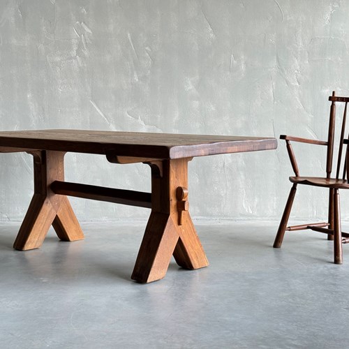 An Oak Dining Table By De Puydt