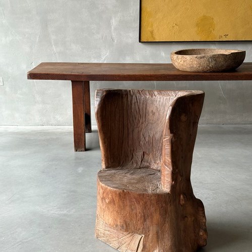 A Primitive Elm Dugout Chair