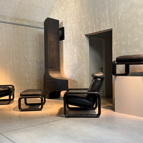A Pair Of Postmodern Leather Easy Chairs