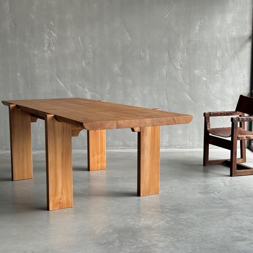 A Solid Elm Table By Luigi Gorgoni