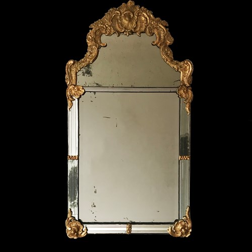 A North European 18Th Century Giltwood Mirror