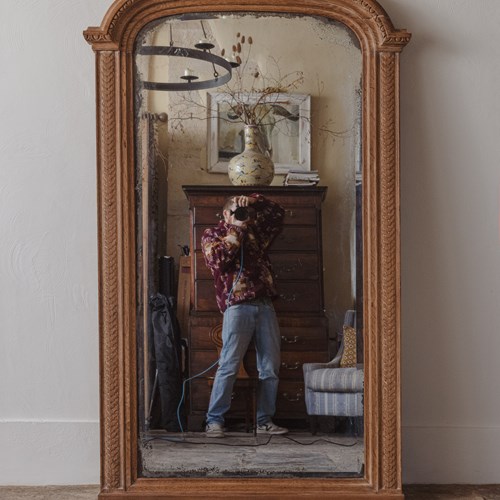 A Louis XVI-Style Carved Oak Pier Mirror