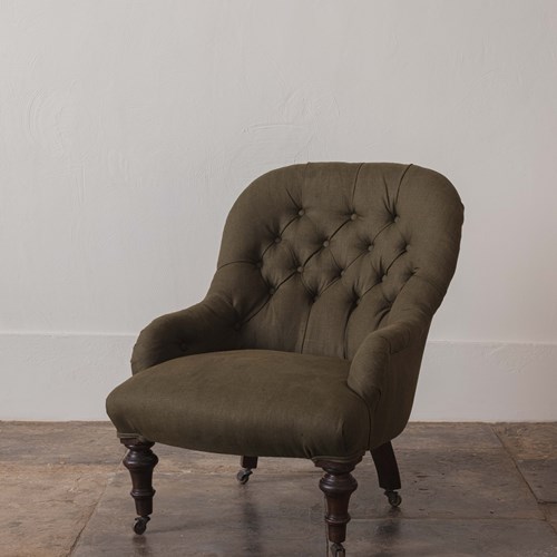 A Victorian Button Back Armchair