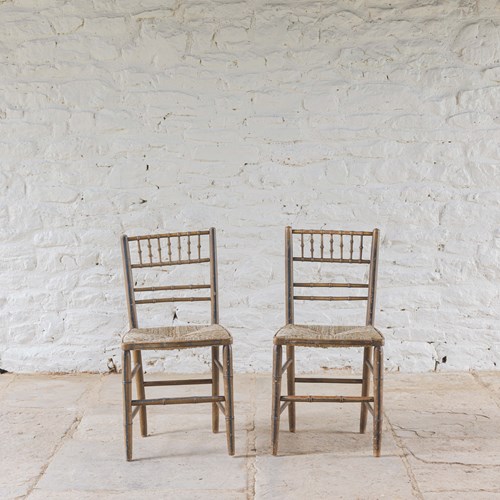 A Pair Of Regency Painted Chairs