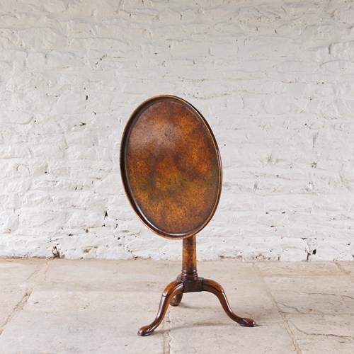 A Mid-Century Burr Walnut Tilt Top