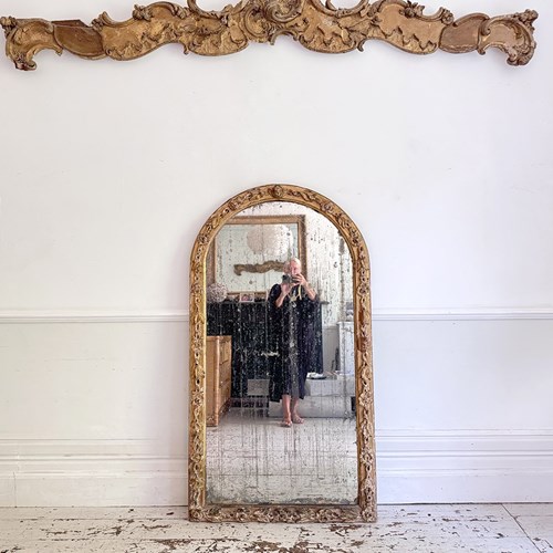 An 18Th Italian Carved Giltwood Mirror