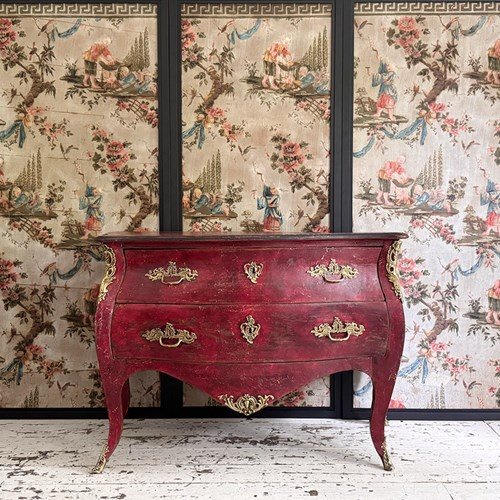 An 18Th C French Red Painted Bombe Commode With Original Brass Handles