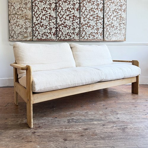 A 1970'S French Pine Sofa With French Linen Upholstery