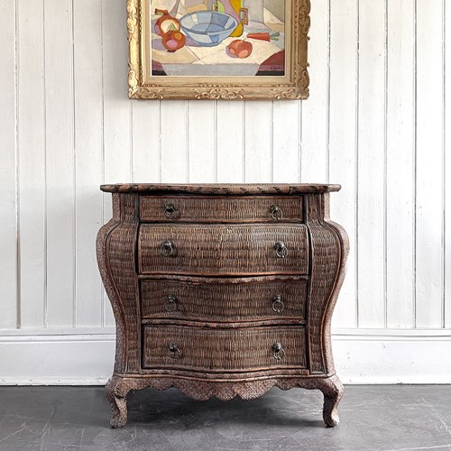A 1970'S French Rattan Bombe Commode