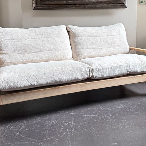 A 1970'S French Three-Seater Sofa With French Linen Upholstery