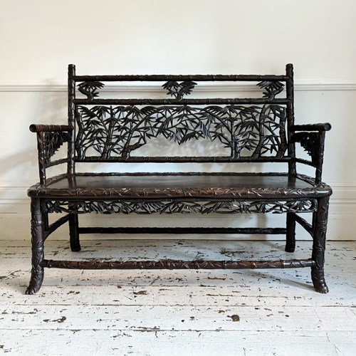 An Ornately Carved Late 19Th C Chinese Hardwood Bench