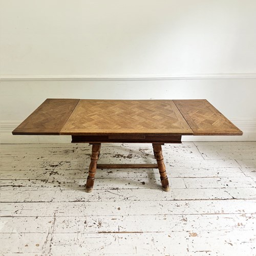 A 19Th C Swiss Parquetry Drawer Leaf Dining Table