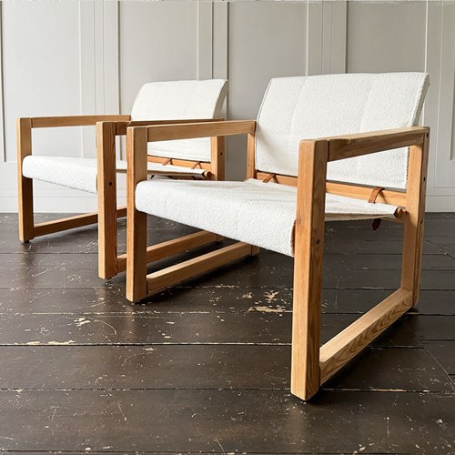 A Pair Of 1970'S French Pine Armchairs With Ivory Bouclé Sling Seats