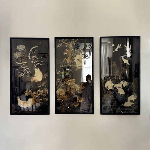 A Set Of Three Japanese Hand-Embroidered Panels On Black Silk