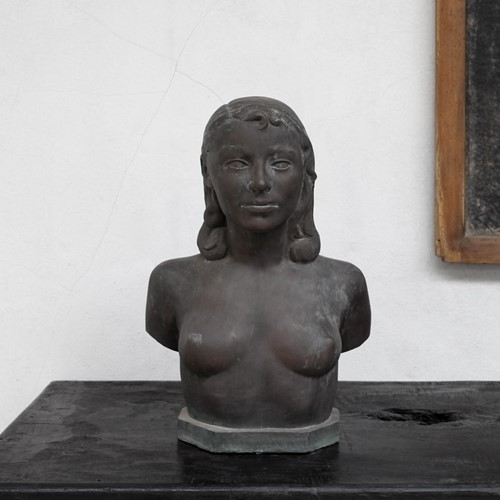 Signed verdigris bronze bust of a woman