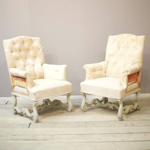Pair Of French Buttoned Armchairs With Carved Frame