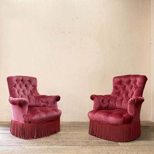 Pair Of Deep Buttoned Armchairs