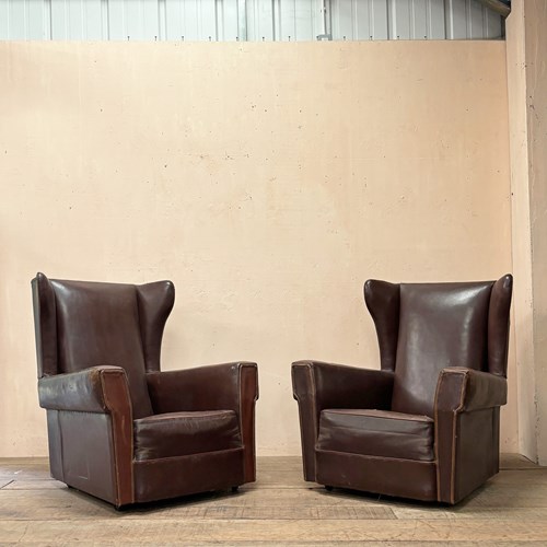 Pair Of Leather Wing Chairs 