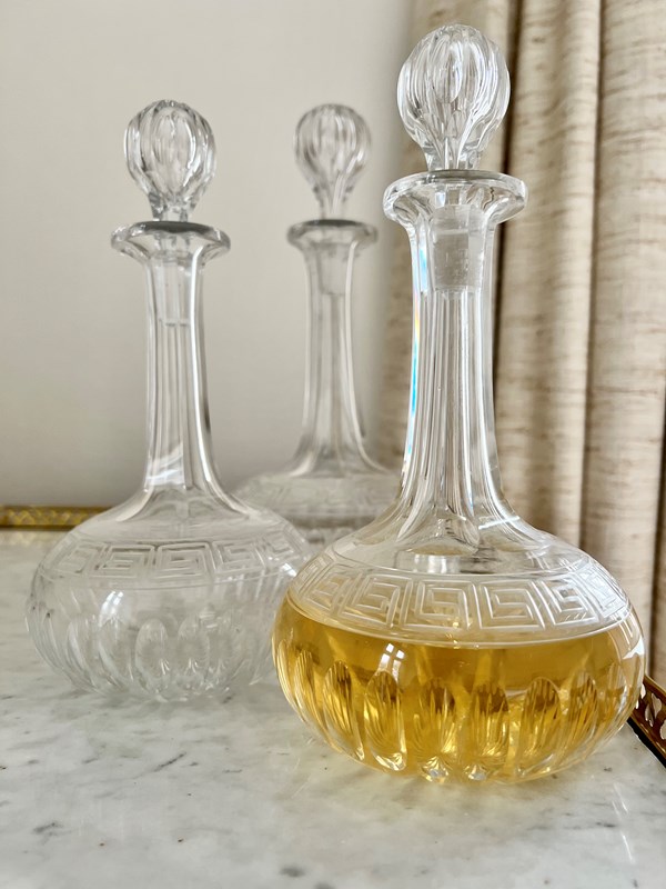 A Trio Of Greek Key Etched Cut Crystal Wine Decanters-the-vintage-entertainer-96386bb0-999b-4adf-a4f5-69e94f81d276-main-638050712566274718.jpeg
