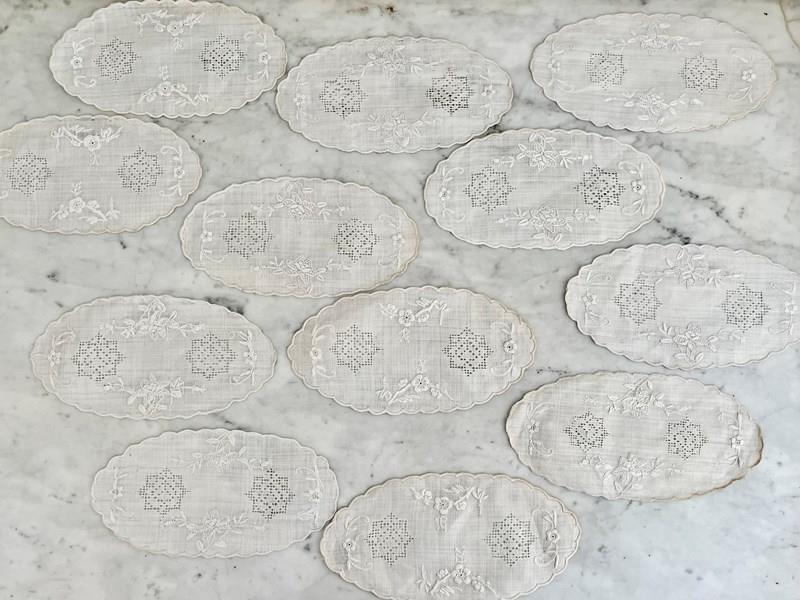 12 Victorian Embroidered Linen Oval Drinks Mats-the-vintage-entertainer-img-5188-main-638252092512061722.jpeg
