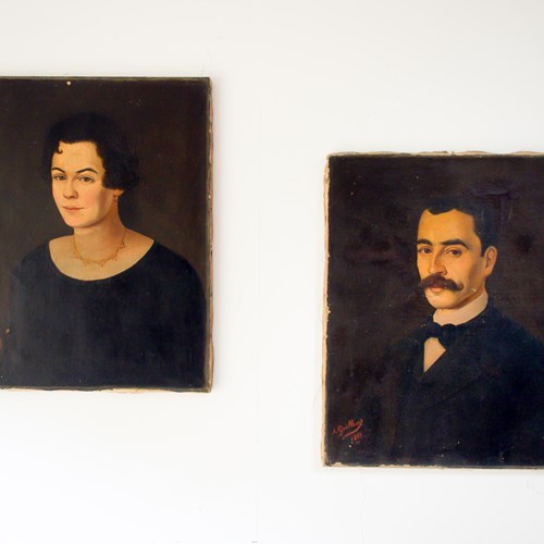 A Pair Of Oil On Canvas Portraits