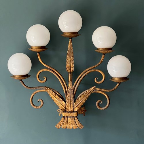 A Large Patinated Gilt Metal Five Branch Wall Light Sconce