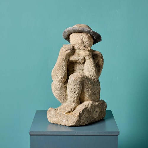 Antique Carved Limestone Statue Of A Boy Playing Pipes