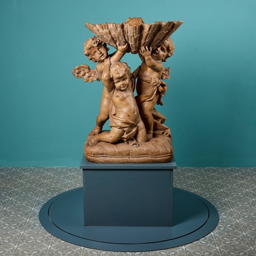 An Italian Baroque Style Putti Statue Cherub Group