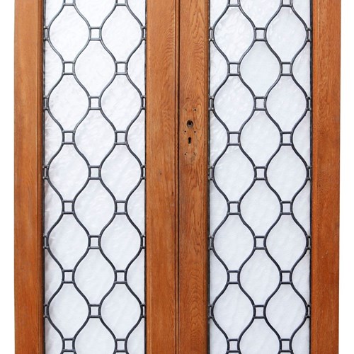 A Set Of Reclaimed Oak Double Doors With Leaded Glass