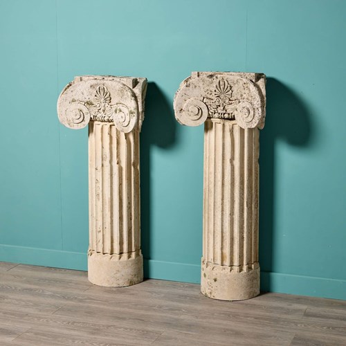 Two Antique Limestone Ionic Column Pedestals