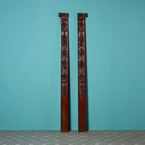 Two Antique Carved Mahogany Pilasters