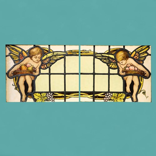 Pair Of Stained Glass Panels Of Putto