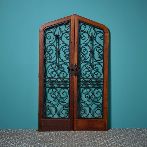 Set Of 20Th Century Glazed Arched Doors With Wrought Iron Bars