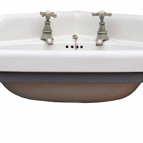 An Antique Corner Basin With Wall Bracket