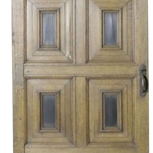 An 18Th Century English Eight Panel Oak Door